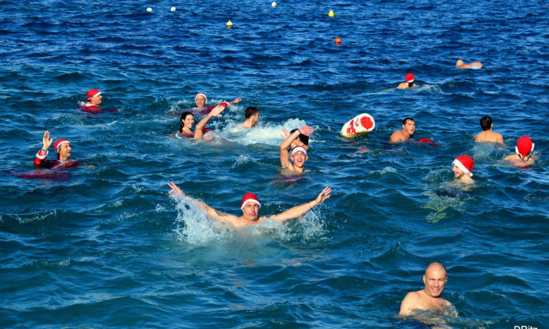 people swimming in December as part of the Thomas Smith Christmas Charity Swim